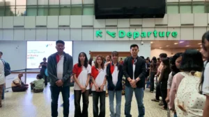 Kanji Masters Academy students and staff at an airport